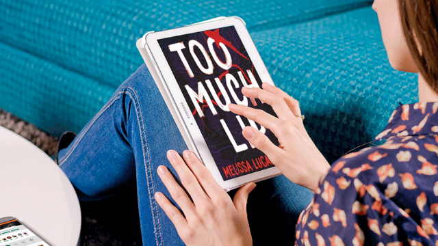 Woman reading 'Too Much Lip' on a tablet