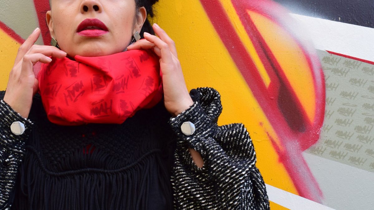 Image of woman in bright red scarf: blog banner