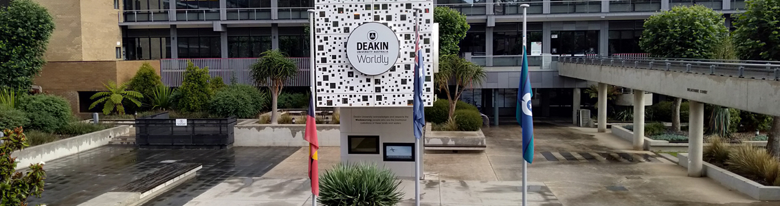 The Indigenous flag flys half-mast at Deakin's Waurn Ponds Campus