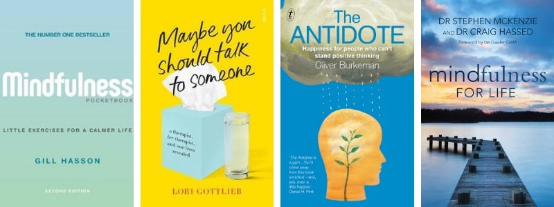 Library book covers of titles about mental health and mindfulness