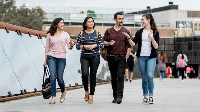 Four students walking at Burwood Campus