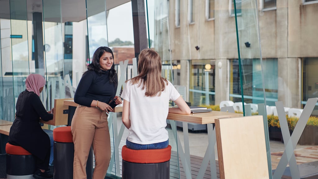 Two students chatting at Burwood Campus