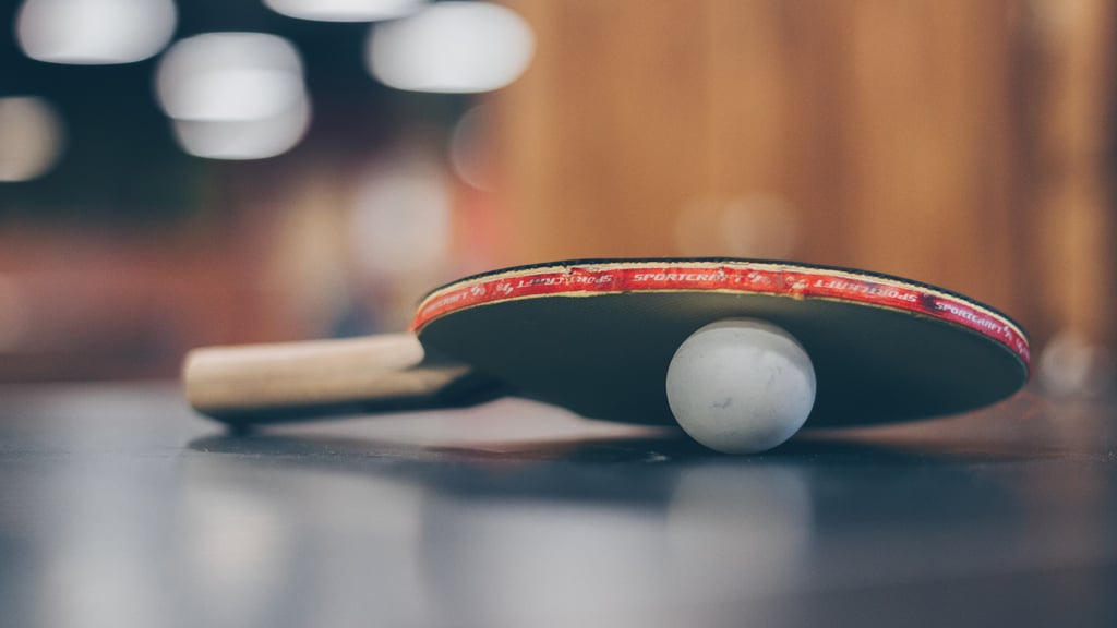 Table tennis racquet and ball