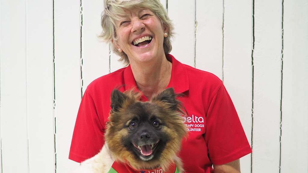 A Delta Dogs trainer and dog