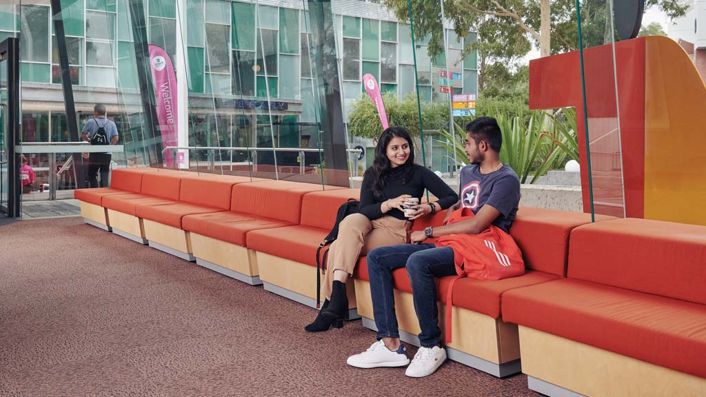 Two students chatting at Burwood Campus