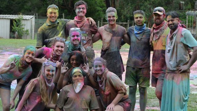Group of students after colour powder run at DUSA O-Camp