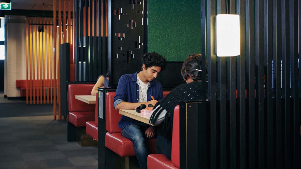 Students working in Burwood Library study booth