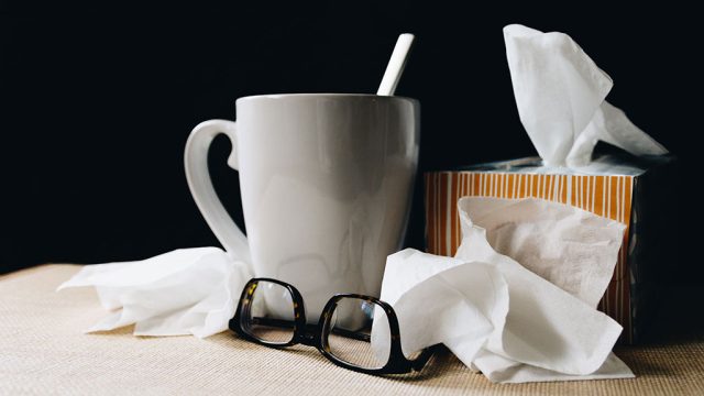 Tissues, mug and glasses