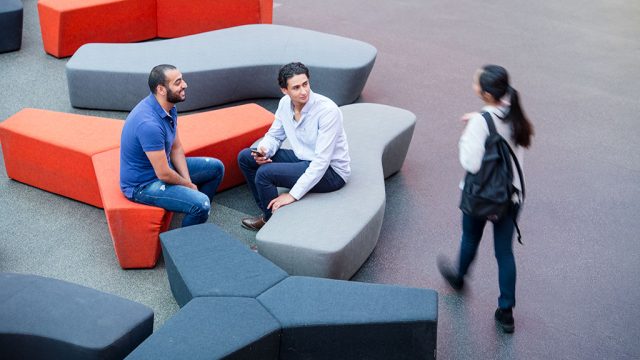 Three students in common area at Burwood Campus