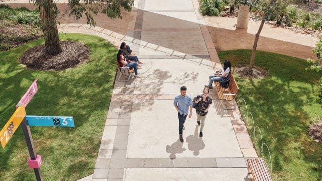 Students walking along footpath at Burwood Campus