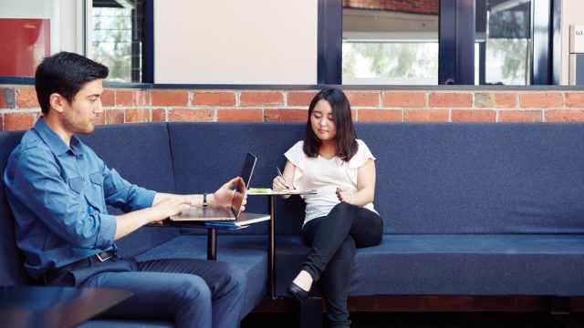 Two students studying in communal area at Burwood Campus