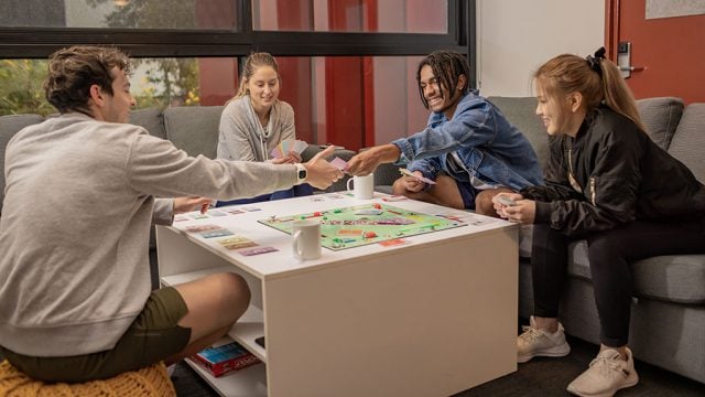 Deakin Res students playing board game