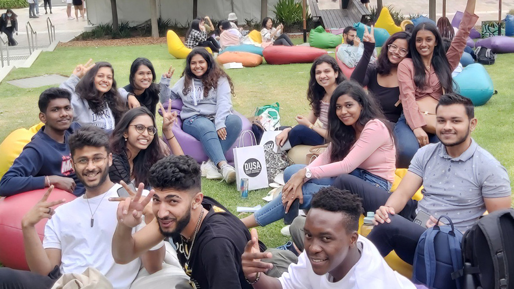 Students relaxing at OWeek event