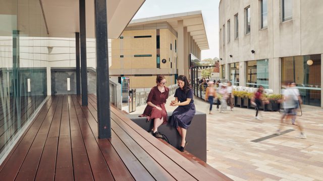 Two students looking at a phone at Waurn Ponds Campus
