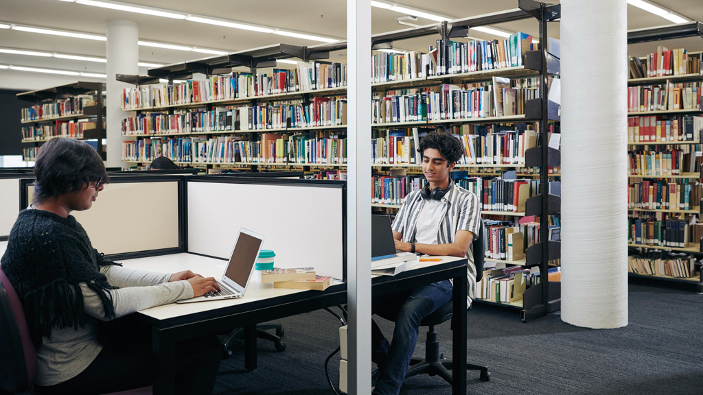 Students at desks in the Burwood Campus library