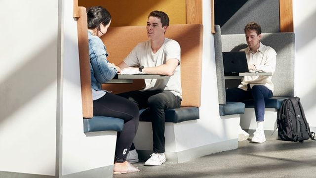 Students sitting in booths at Burwood Campus