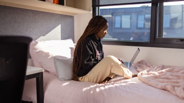 Female student studying in Res room