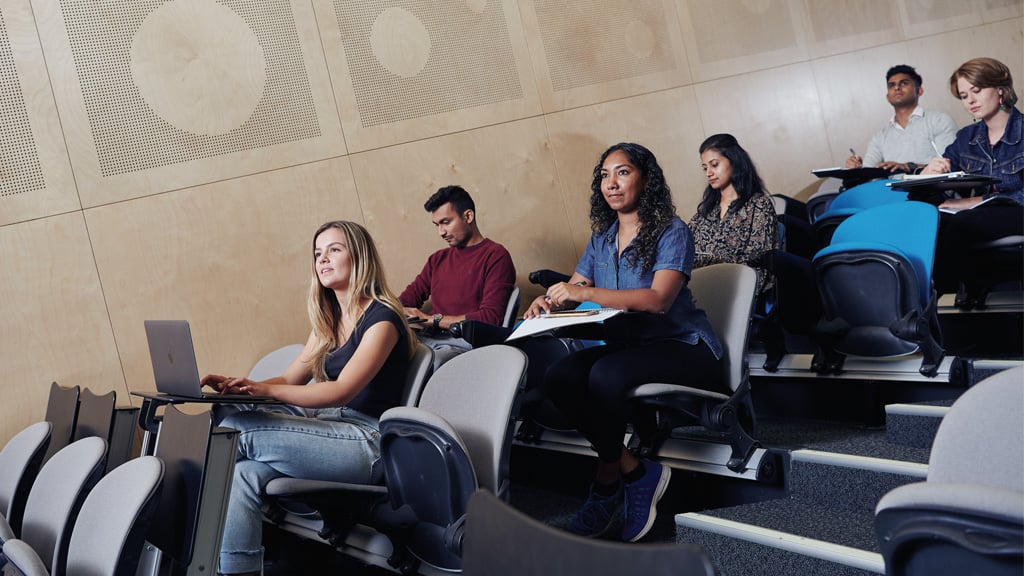 Group of students listening in lecture theatre at Burwood Campus