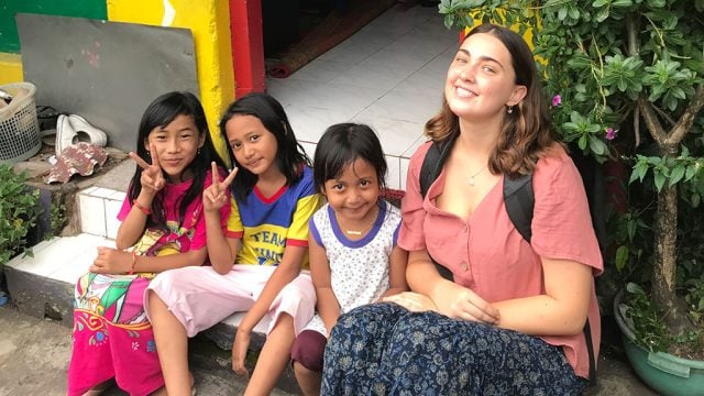 NCP Ambassador Genevieve Pop with schoolchildren in Indonesia