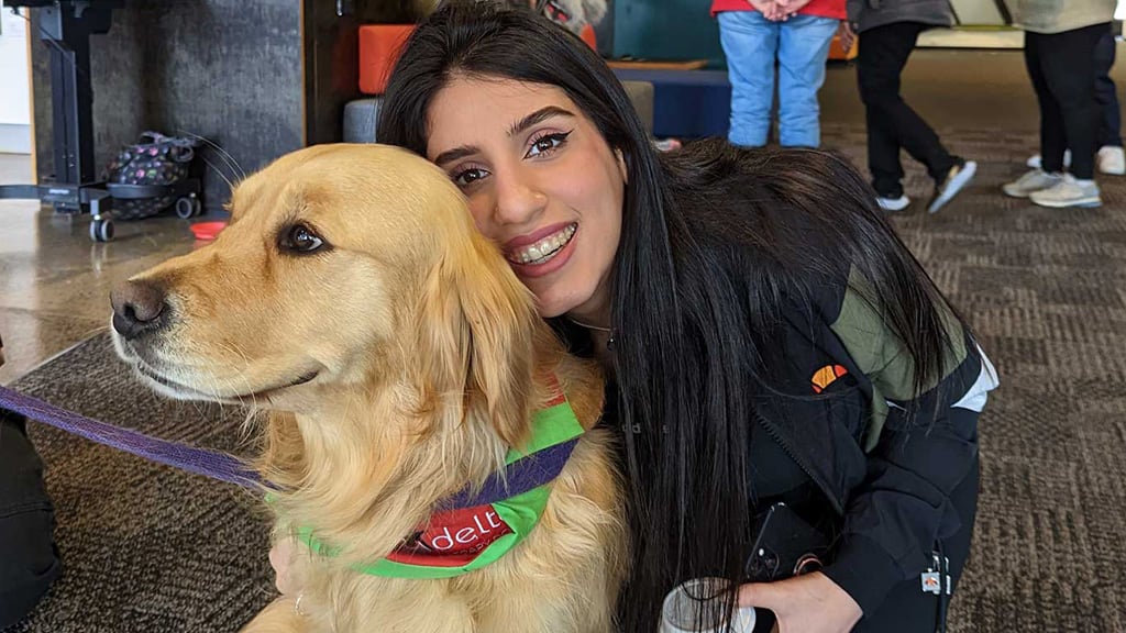 Therapy dog and student