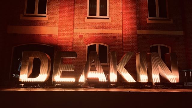 Illuminated Deakin sign at Waterfront Campus