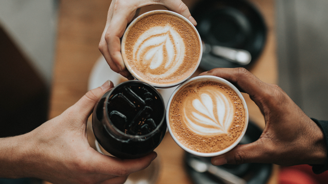 Latte art on coffee in cups