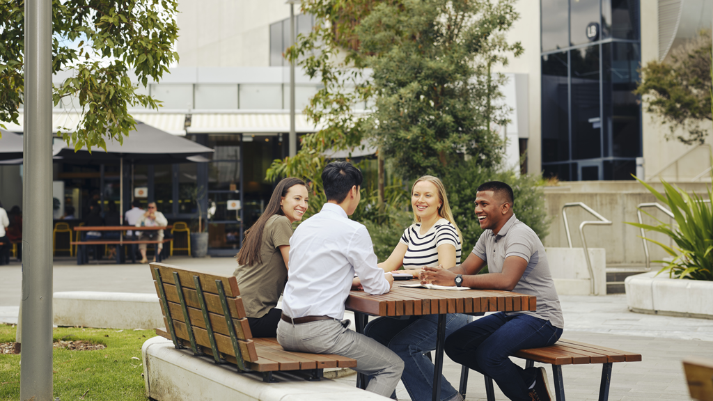 Students working together outside at Burwood Campus