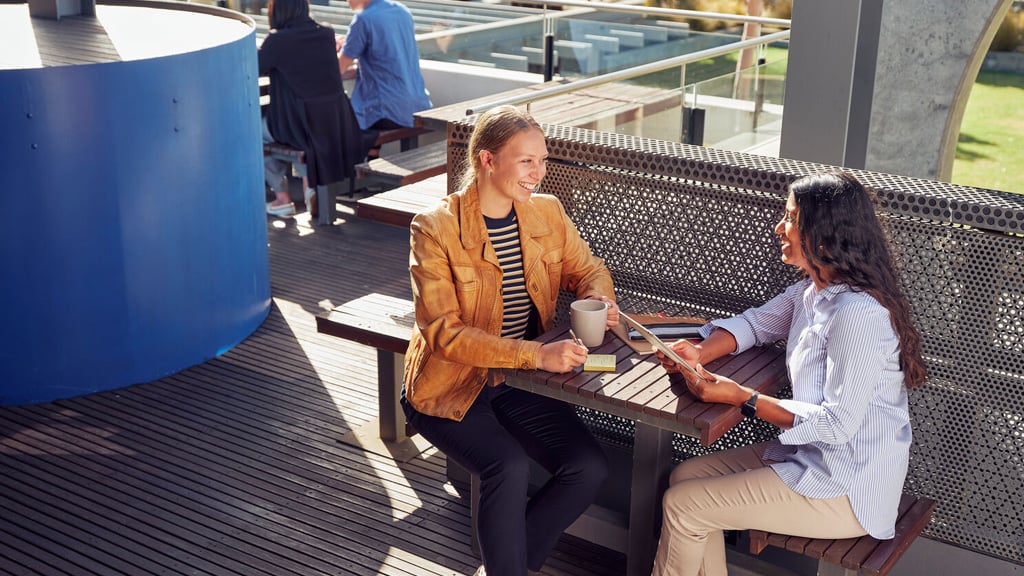 Two students chatting outside at Waurn Ponds