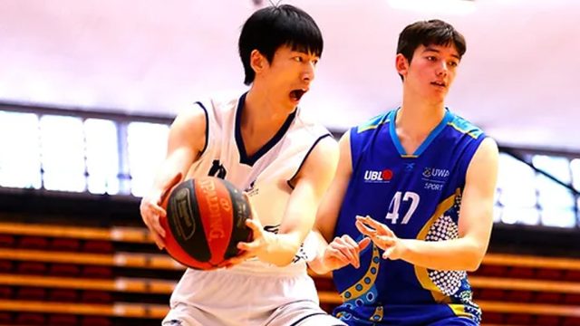 International students playing basketball