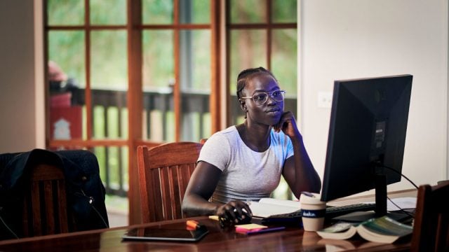 Woman working at her computer