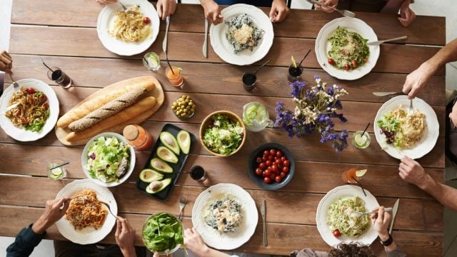 People sharing a meal around a table