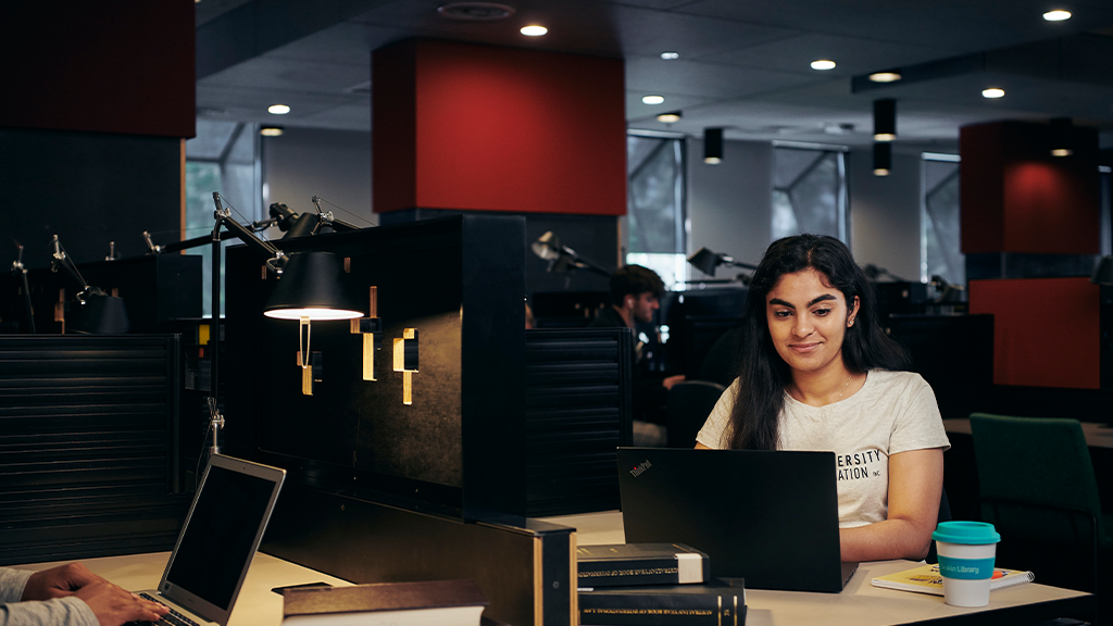 A student studying in the library