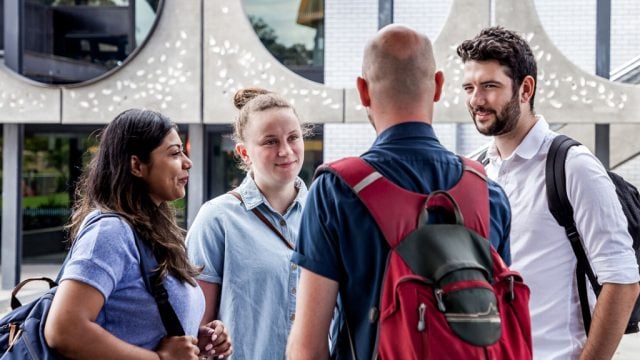 Group of students chatting outside at Waurn Ponds Campus