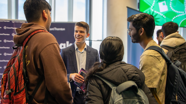 Students talking at a DeakinTALENT session.